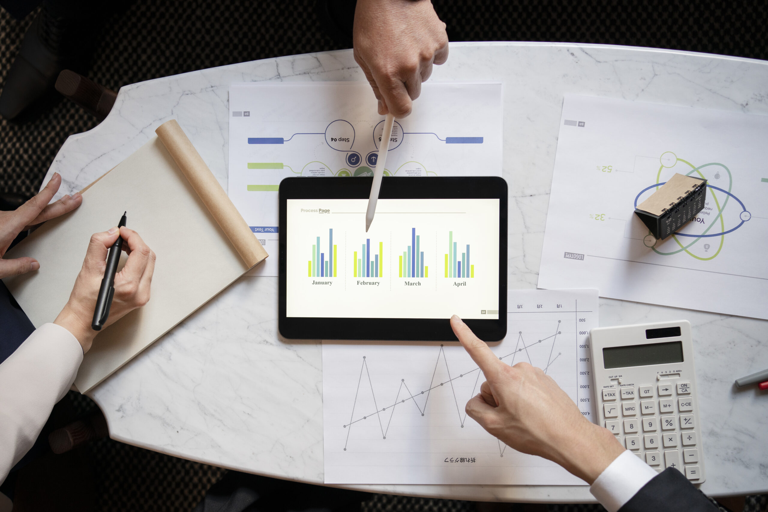 top-view-business-people-working-with-ipad